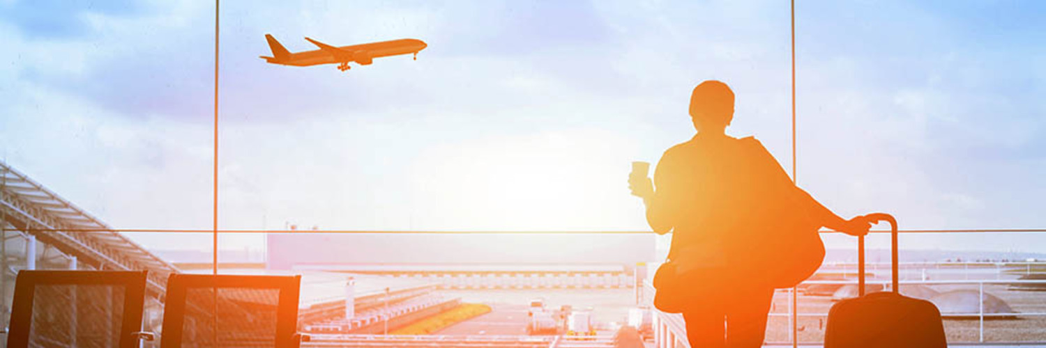 Person in airport waiting for plane 