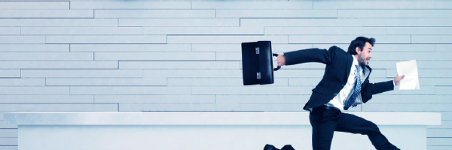 man running with briefcase 